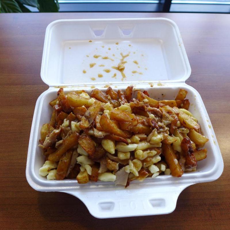 Romados Poutine Romados Poutine