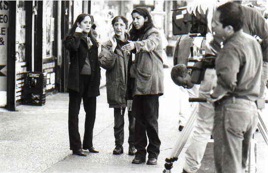 [Nisha directing Madhur, Sakhina]